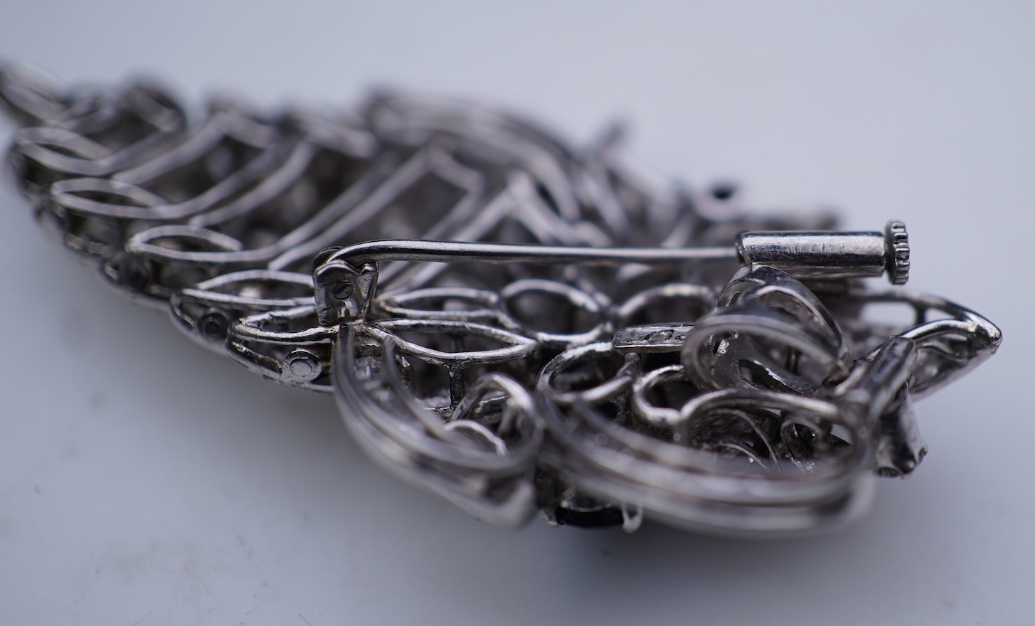 A sapphire and diamond brooch, mid 20th century